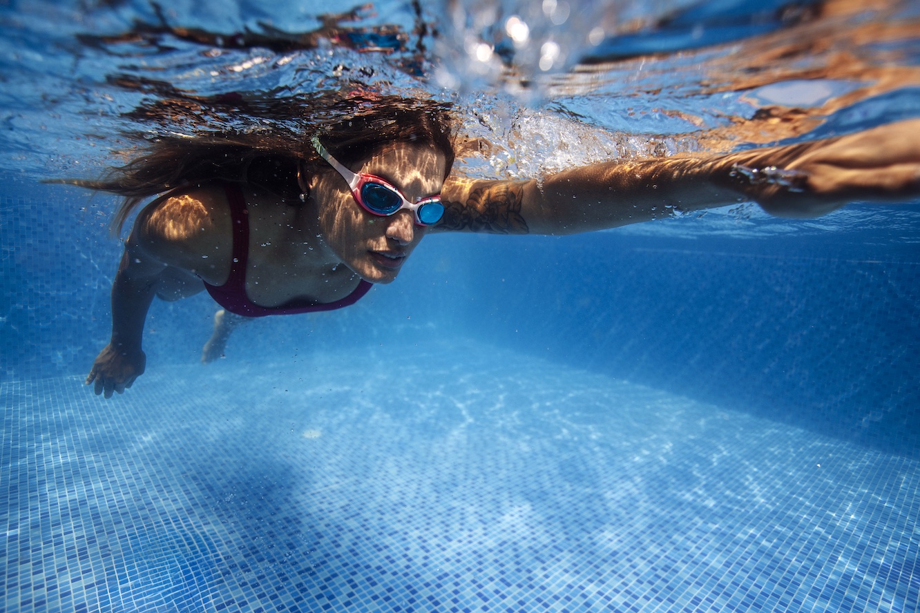 Person swimming underwater